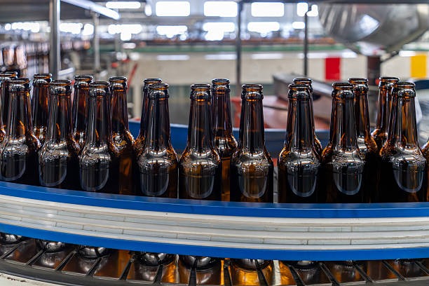 imageye___-_imgi_23_the-neatly-arranged-glass-bottles-on-the-factory-glass-bottle-production-line.jpg