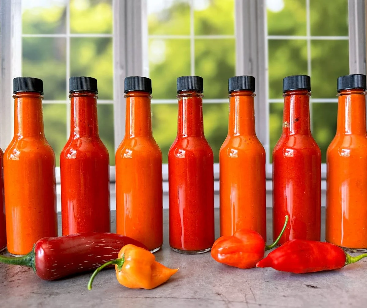 fermented-pepper-hot-sauce-recipe-feature-bottles.webp