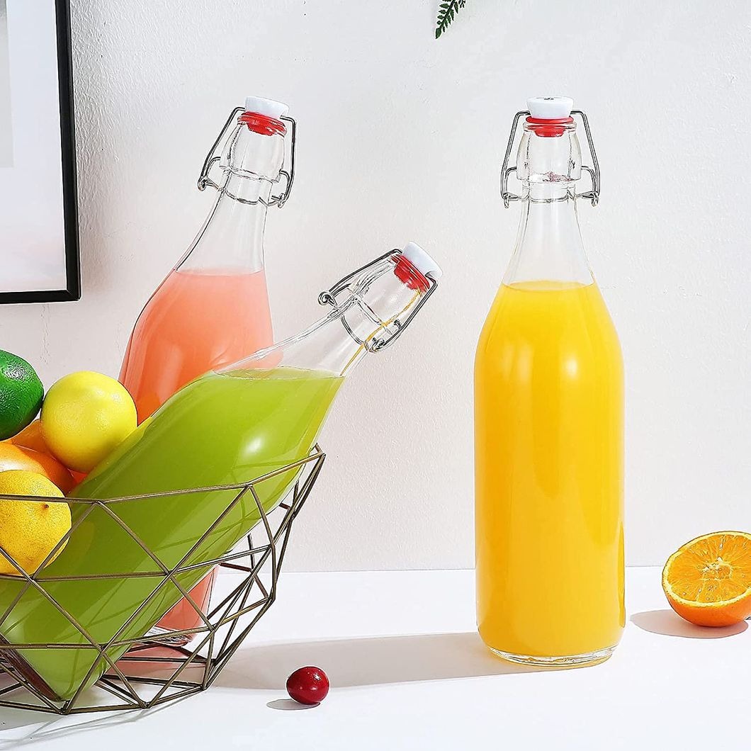 imageye___-_imgi_142_Wholesale-Juice-Water-Kombucha-Wine-Swing-Top-Clear-Glass-Bottles.jpg